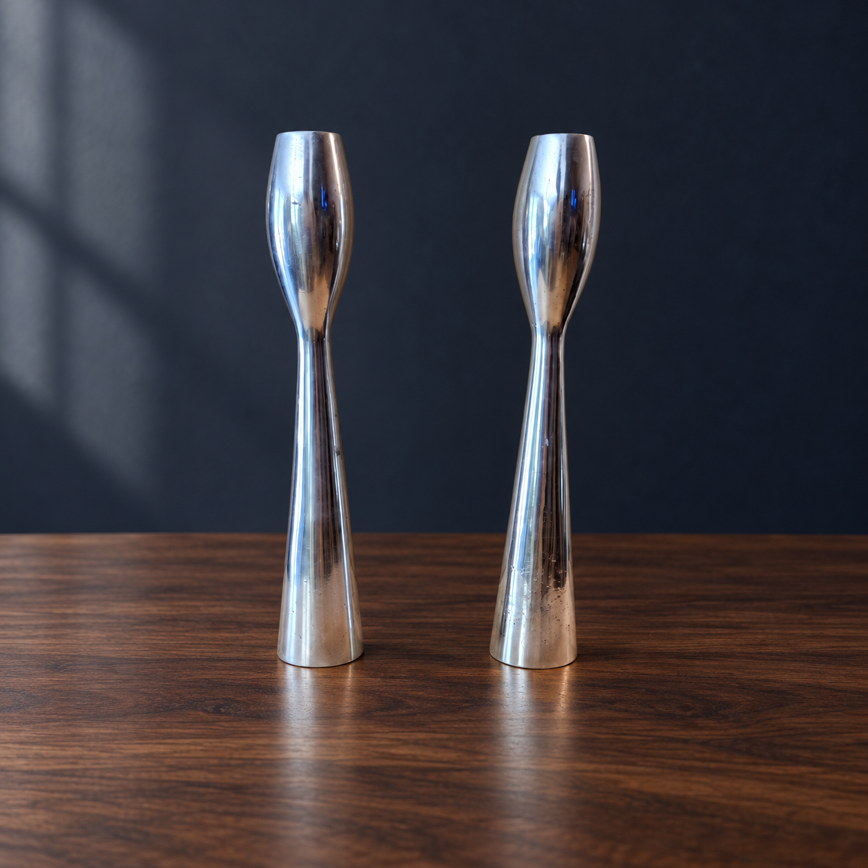 Silver Poise · Modernist Candlestick Pair — AI-styled preview; props not included