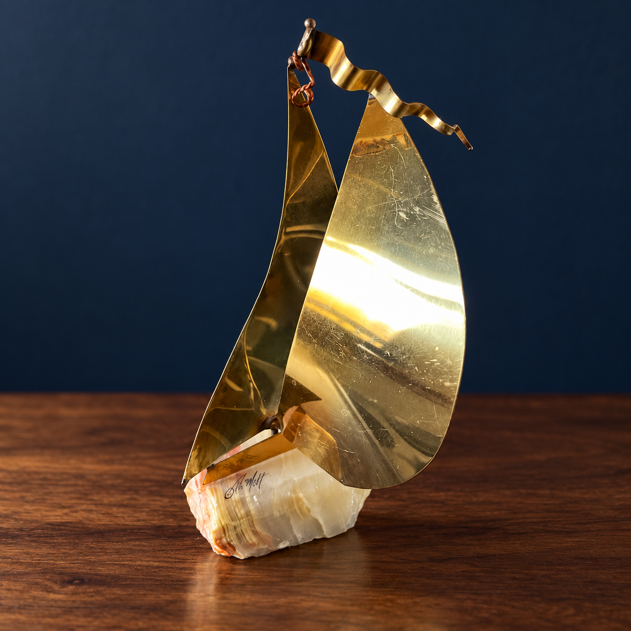 Golden Sail · Signed DeMott Brass Sculpture — AI-styled preview; props not included