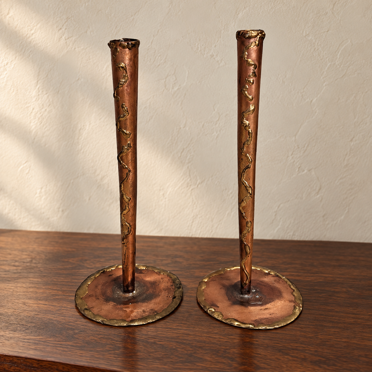 Molten Lines · Copper & Brass Candleholder Pair — AI-styled preview; props not included